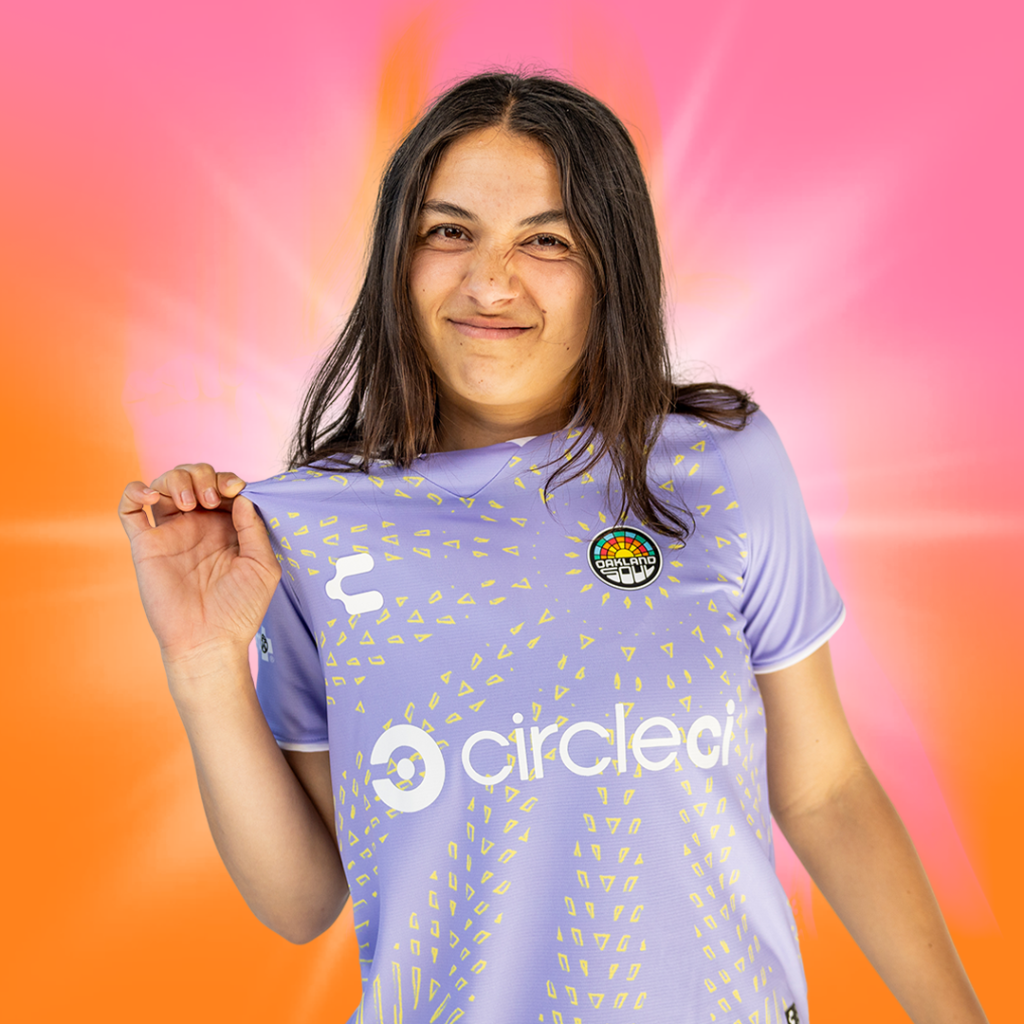 Image of Miranda Nild in and Oakland Soul SC lilac jersey.